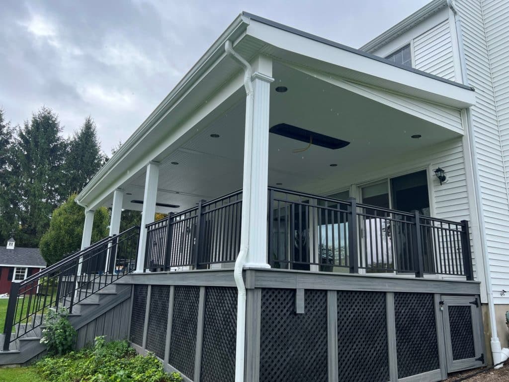 black and white deck with white beams and roofing